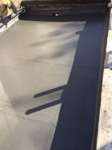 Freshly poured concrete surface with a smooth finish and subtle shadowing.